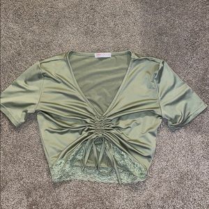 green ruffled tie crop top